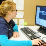 technician viewing the MRI images